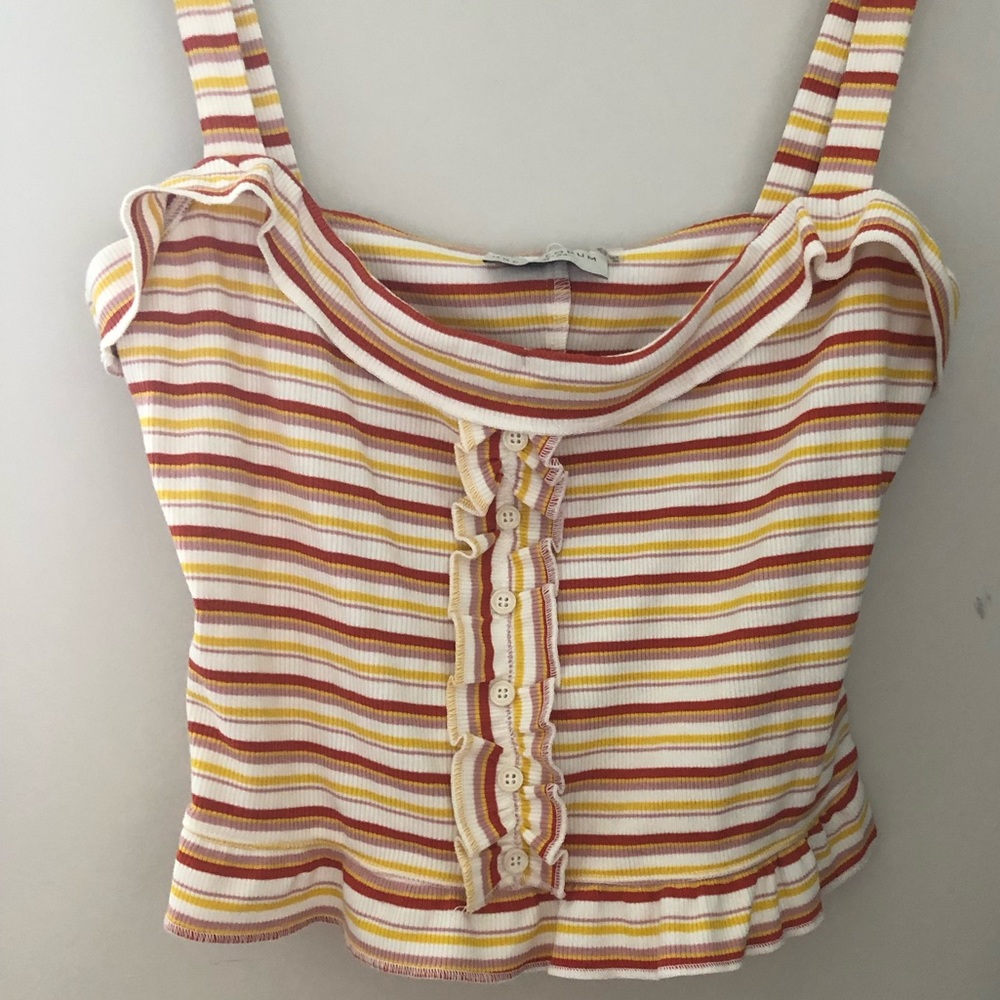Boutique brand tank top. With fun colors and ruffles.